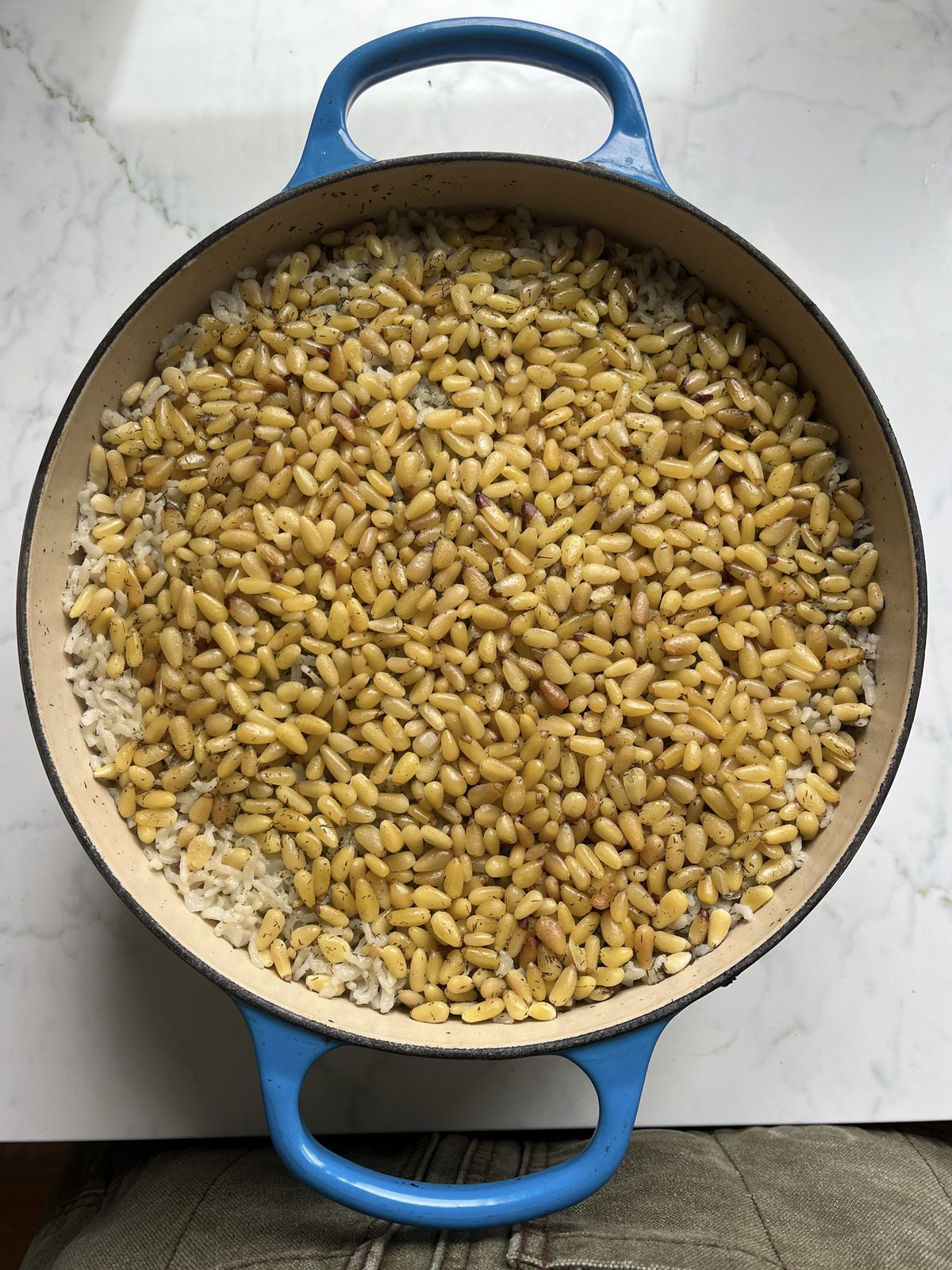 Rice pilaf finished with toasted pine nuts