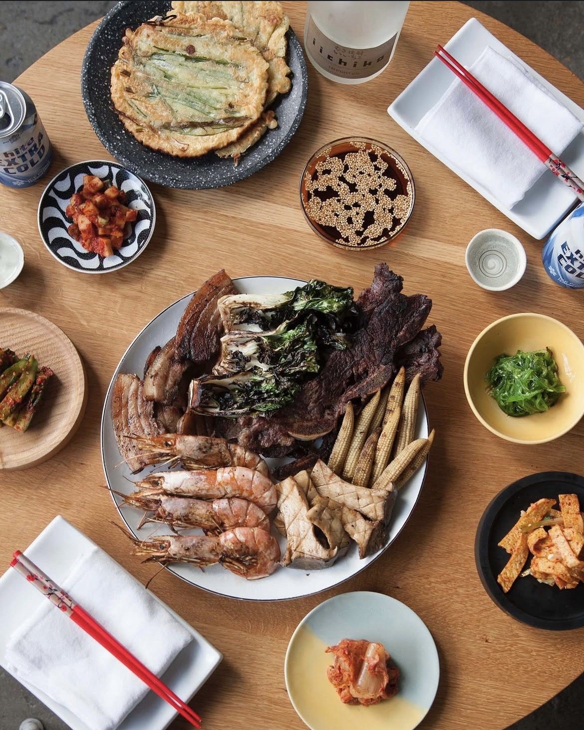 Korean-style barbecue spread with banchan